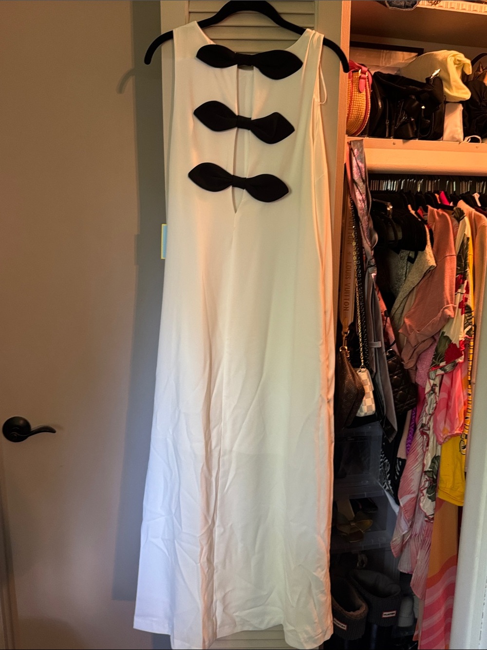 White Maxi Dress with Black Bow Accents